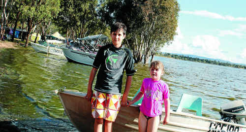 Liam and Biance Markham cool off in the water at Leslie Dam on Thursday. Liam and Biance Markham cool off in the water at Leslie Dam on Thursday.